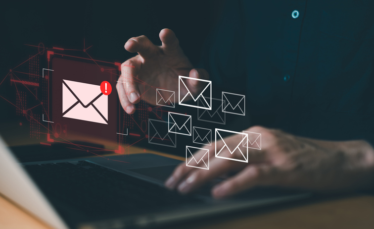 Business man using smartphone and computer that show warning sign after got attack phishing email by malware from hacker that commit cyber crime or software crash to cause an error.